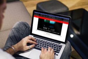Guy-looking-at-mac-book-and-nerved-review